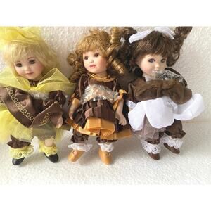 vintage Marie Osmond Fine Porcelain Tiny Tots dolls